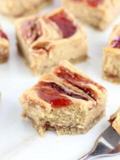 Peanut Butter & Jelly Swirl Cheesecake Bars Photo