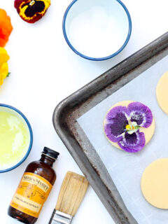 Orange Cookies with Edible Flowers Pic