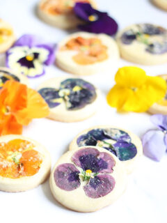 Orange Cookies with Edible Flowers Picture