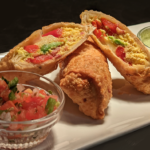 Breakfast egg rolls from Illinois chef KC Gulbro, cut open.