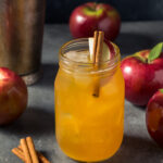 Cold Refreshing Apple Cider Cocktail with Rum and Cinnamon