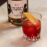 Smuggleroni coconut rum negroni cocktail with Coconut Cartel rum